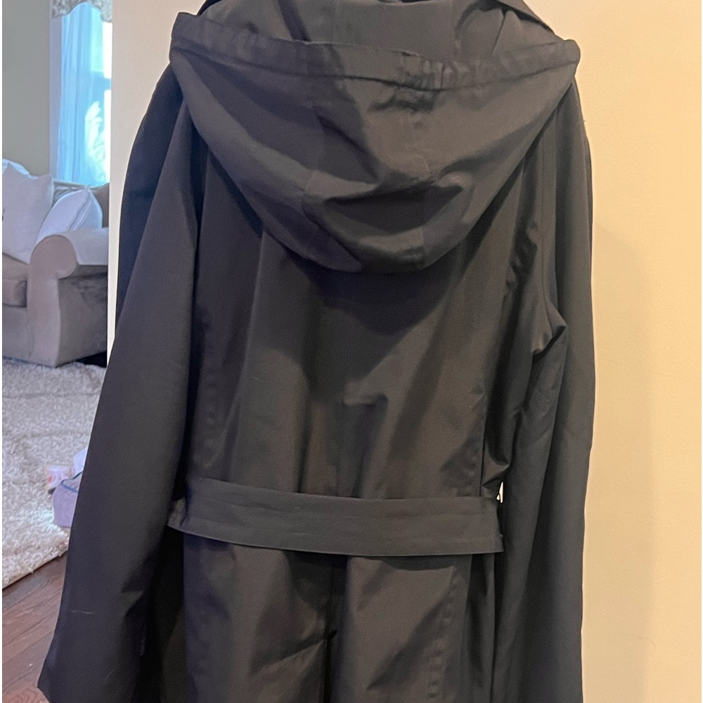 Black London Fog water repellent trench coat. Detachable hood w/sash belt.